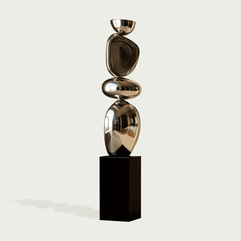 Stainless Steel Irregular Balancing Floor Sculpture on a white background