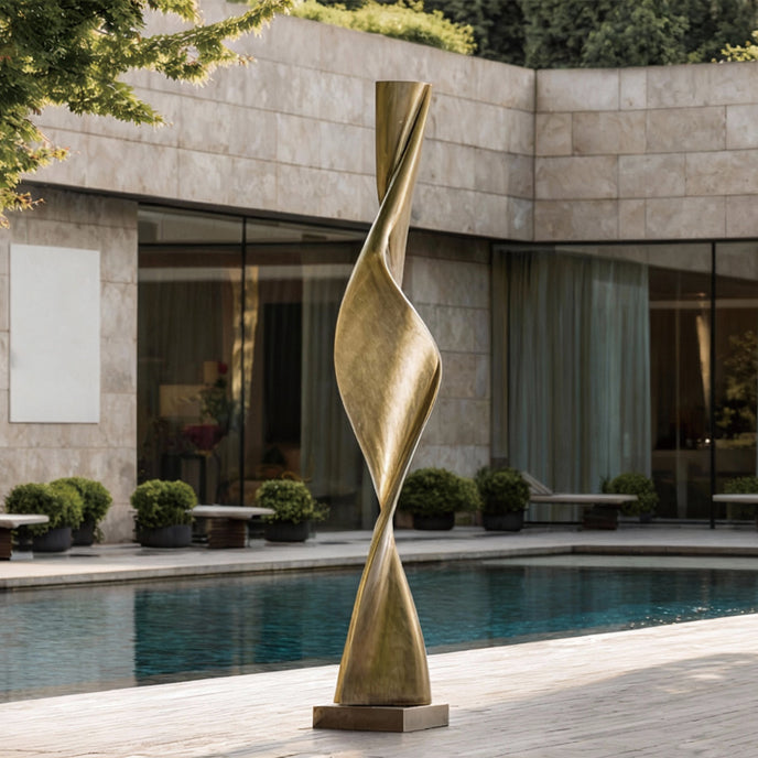 wisted Column Garden Bronze Sculpture  by a poolside with modern building in the background