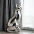 Sleek Minimalist Cat Statue Stainless Steel Sculpture in a modern living room