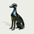 Gleaming Seated Dog Black Statue on a white background