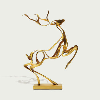 Openwork Golden Stag Abstract Stainless Steel Sculpture set against a light gray background.