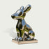 Adorable Cartoon Puppy Outdoor Stainless Steel Sculpture sitting on a rectangular metallic base, photographed against a plain light gray background.