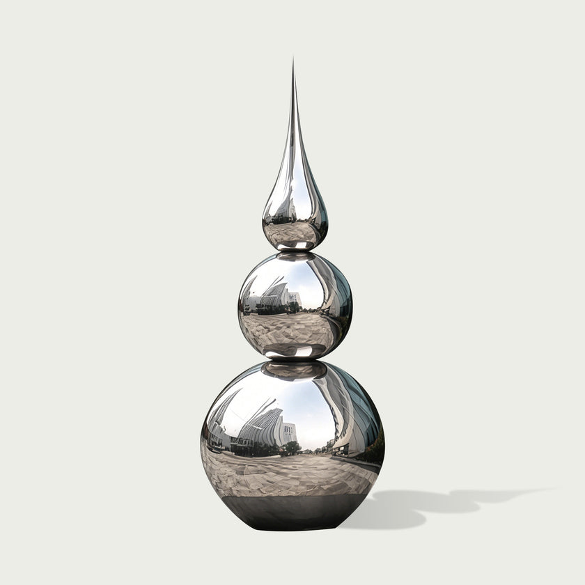 Striking Teardrop Tower Outdoor Stainless Steel Sculpture reflective spheres and a teardrop-shaped finial, shown on a plain light gray background.