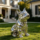  French Bulldog Mirror Polished Stainless Steel Sculpture Lawn Statues  sits on a green lawn in front of a large house.