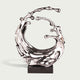 Dynamic Splashing Wave Mirror Stainless Steel Sculpture Large Outdoor Statuary shaped like a liquid splash or wave, mounted on a dark rectangular base against a light gray background.
