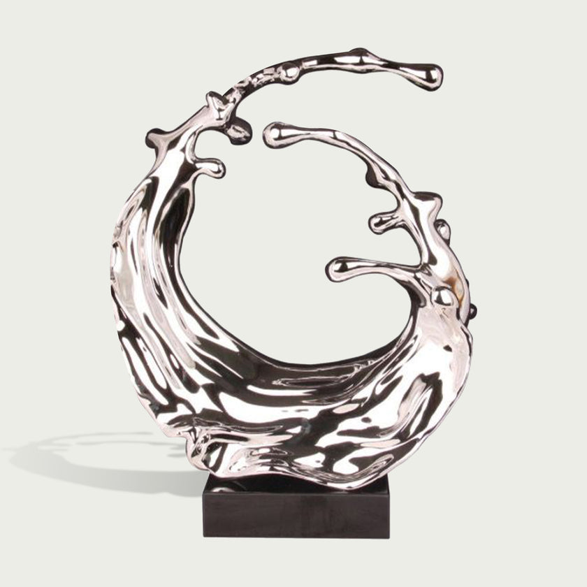 Dynamic Splashing Wave Mirror Stainless Steel Sculpture Large Outdoor Statuary shaped like a liquid splash or wave, mounted on a dark rectangular base against a light gray background.