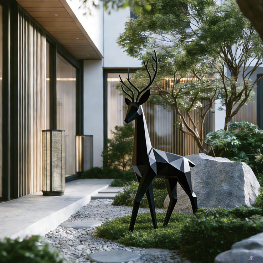Geometric Black Deer Stainless Steel Sculpture in a landscaped garden courtyard beside a contemporary building with vertical slats and trees.