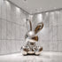 Mirror Polished Balloon Rabbit Stainless Steel Sculpture in a luxury mall