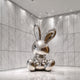 Mirror Polished Balloon Rabbit Stainless Steel Sculpture in a luxury mall