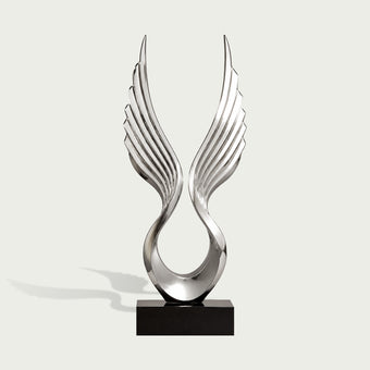 Outstretched Angel Wings Stainless Steel Sculpture on a white background