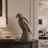 Perforated Texture Bird Mirror Polished Stainless Steel Sculpture on the entrance table in a luxury modern villa