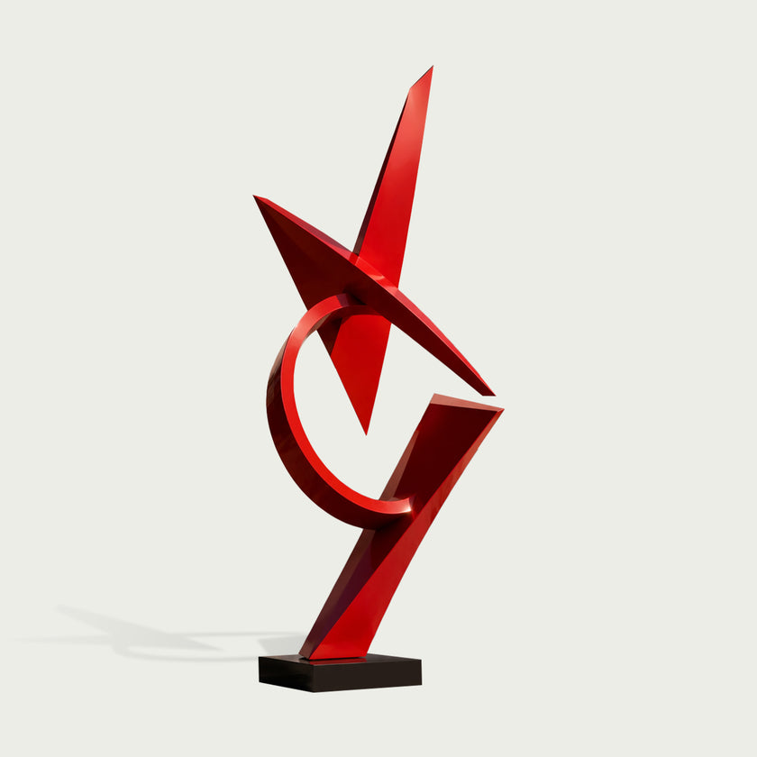 Sharp Angular Geometric Abstract Red Stainless Steel Sculpture on a white background
