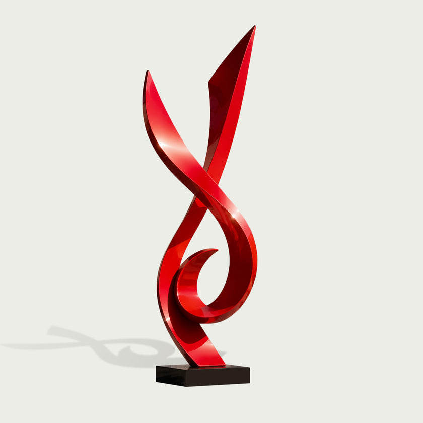 A glossy red abstract sculpture with a black rectangular base, photographed on a clean light gray background.