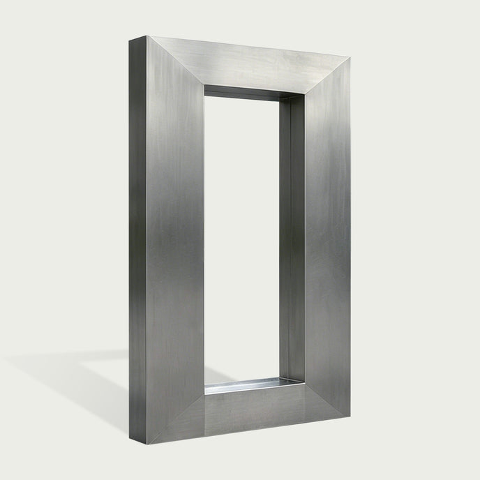 A modern rectangular metal frame with a brushed silver finish, standing upright against a light off-white background.