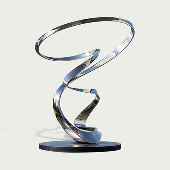 Twisting Silver Band Contemporary Mirror Polished Stainless Steel Sculpture on a white background