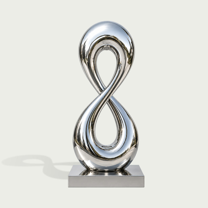 Infinity Loop Water Fountain Mirror Polished Stainless Steel Sculpture on a white background